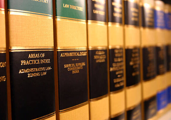 Books on a shelf of a legal library