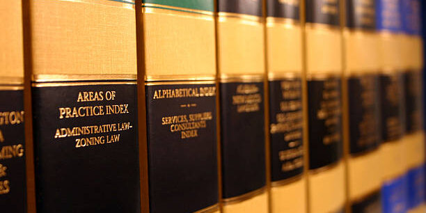 Books on a shelf of a legal library