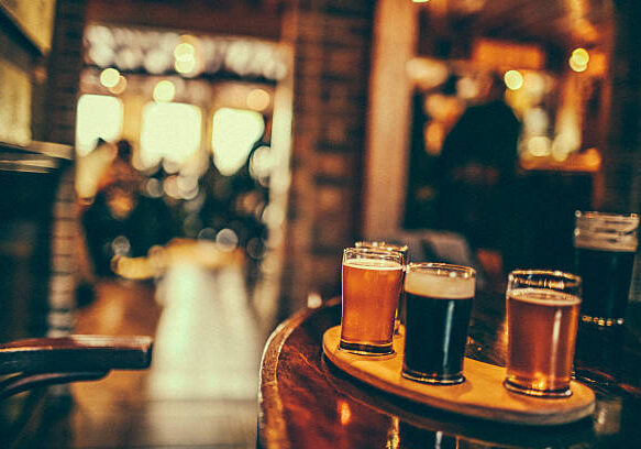 Variety of beers in a pub.