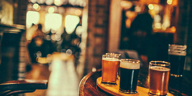 Variety of beers in a pub.